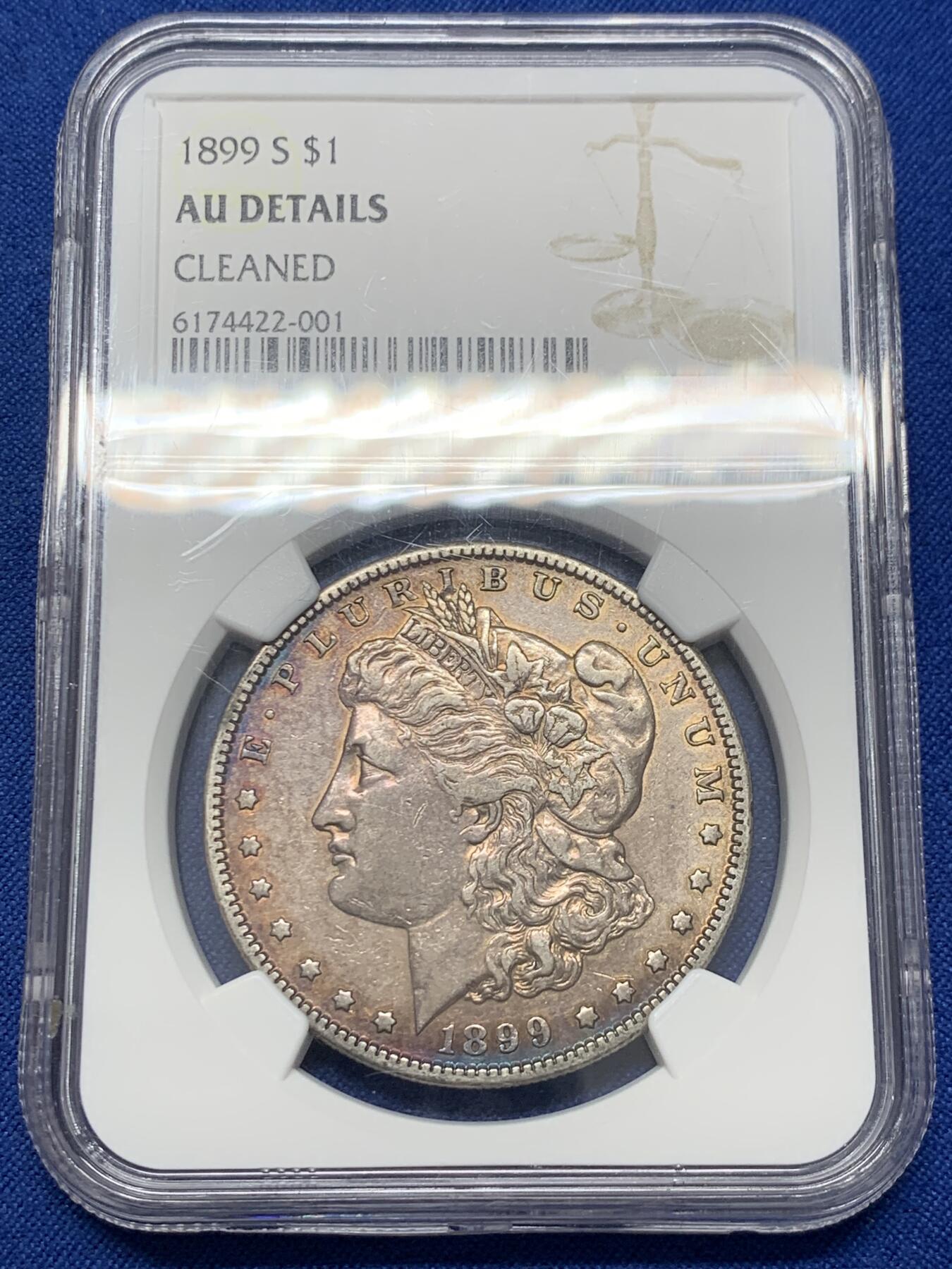 《竞宝斋》第436场 周日，周一2场连拍 （全场包邮） NGC AUD 美国1899年摩根银币S厂 少见摩根，1899年最便宜的是O厂，其次是P厂，最贵S厂， 63分白币指导价800刀，该枚橙金彩，两面深蓝月牙彩。