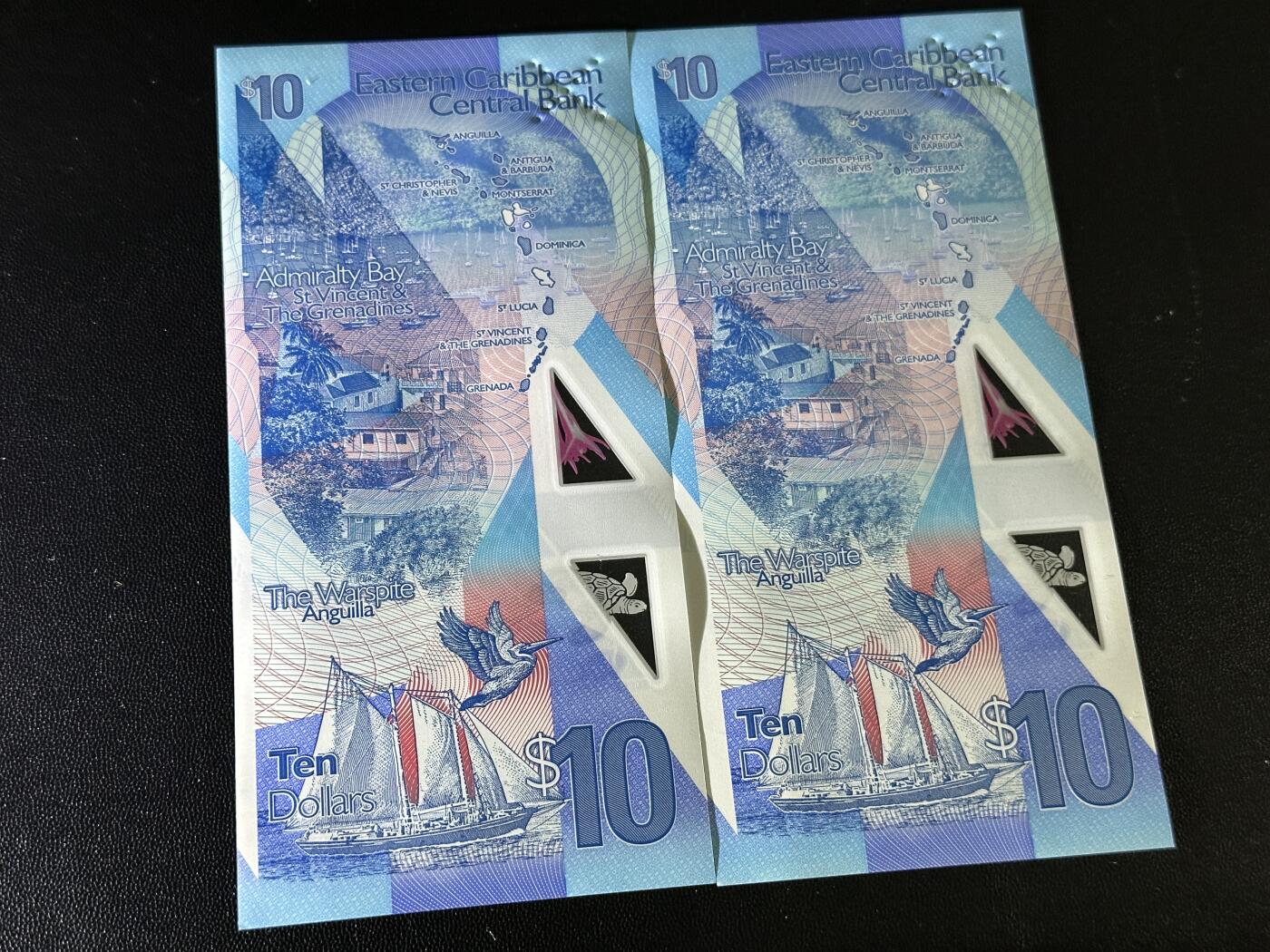 《外钞收藏家》第五百八十三期（精选场）（本期拍品丰富）（本平台长期征集拍品、欢迎藏友们联系合作） 2019年东加勒比10刀 2张一起 全新UNC