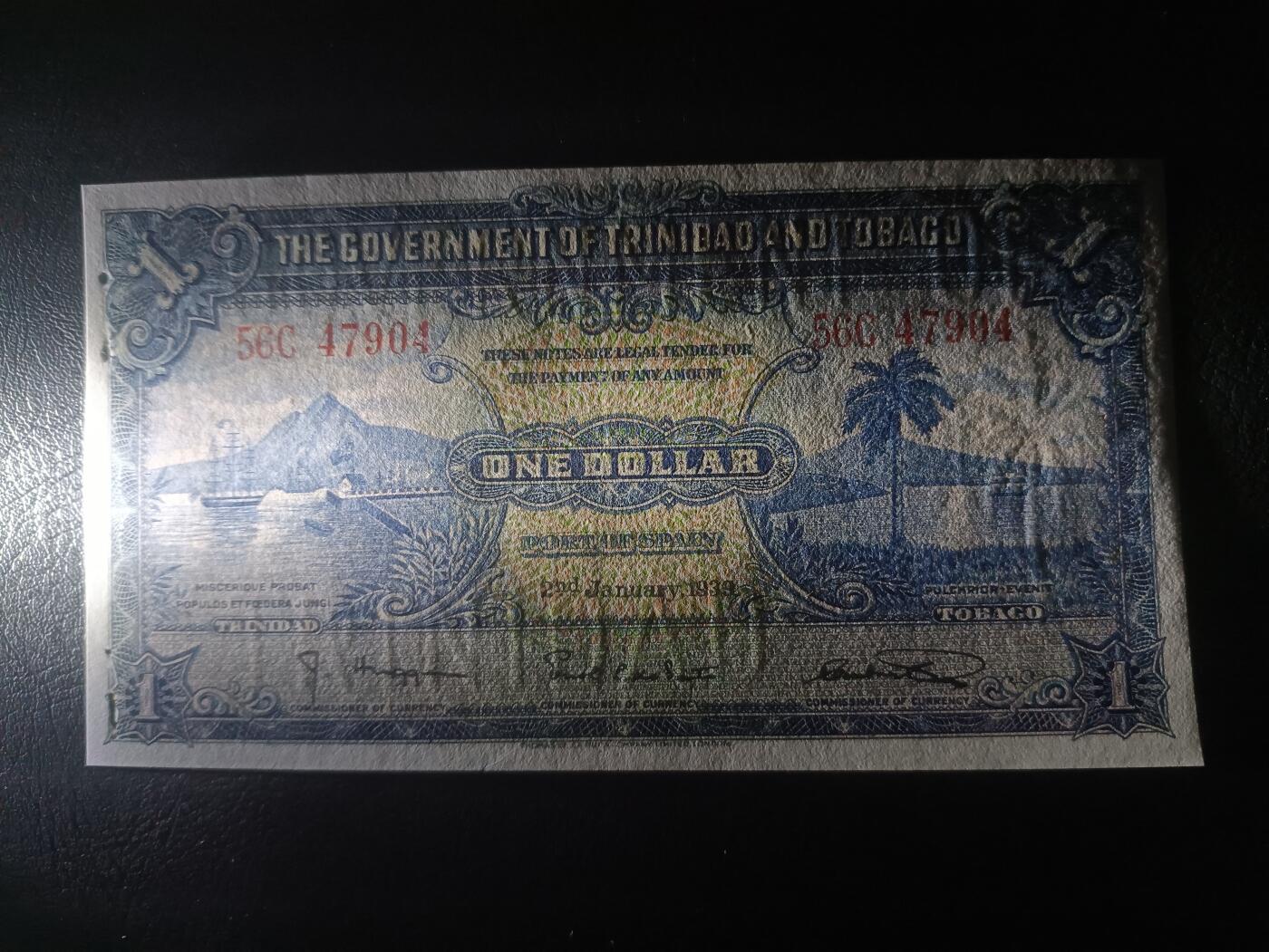 2025十一月第三期，总201期 英属特立尼达和多巴哥1939年1元UNC-有多处孔洞，海湾和总督府徽章，早期少见品种