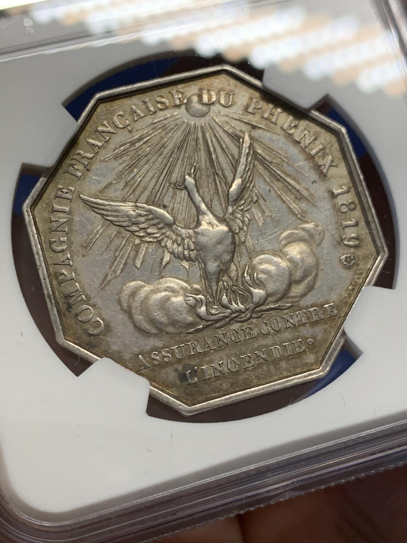 《竞宝斋》第436场 周日，周一2场连拍 （全场包邮） NGC MS61 法国1819路易十八凤凰火灾保险公司八角银质代币，少见版本，出分不易，且玩且珍惜。