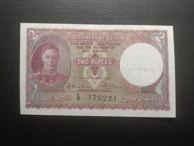 2025十一月第三期，总201期 - 英属锡兰（现斯里兰卡）1942年2卢比流通好品XF，乔治六世国王和锡吉里亚岩，少见英属殖民地品种