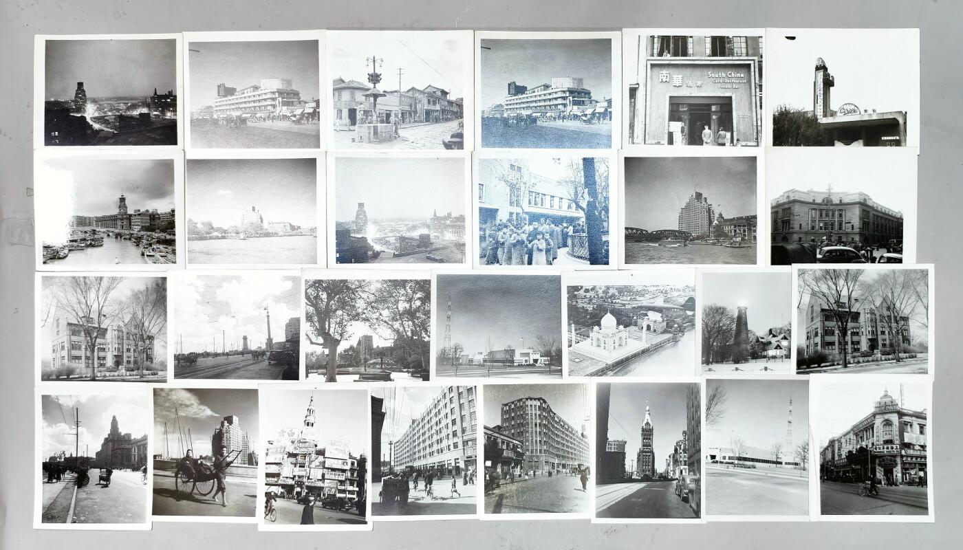 2025年吉藏纸杂文献秋季专场拍卖会 民国摄影家拍摄上海街边建筑精品三十张。南华酒家。中国航空公司，仙乐舞厅，英明照相，大世界等经典建筑影像30张。 9.9×11.9cm-12.6×10.3cm