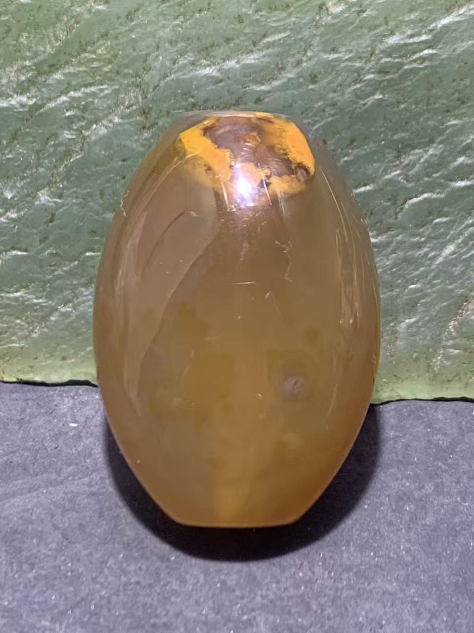 精美冻料飘鸡油黄糖心料战国红玛瑙随形勒子一颗