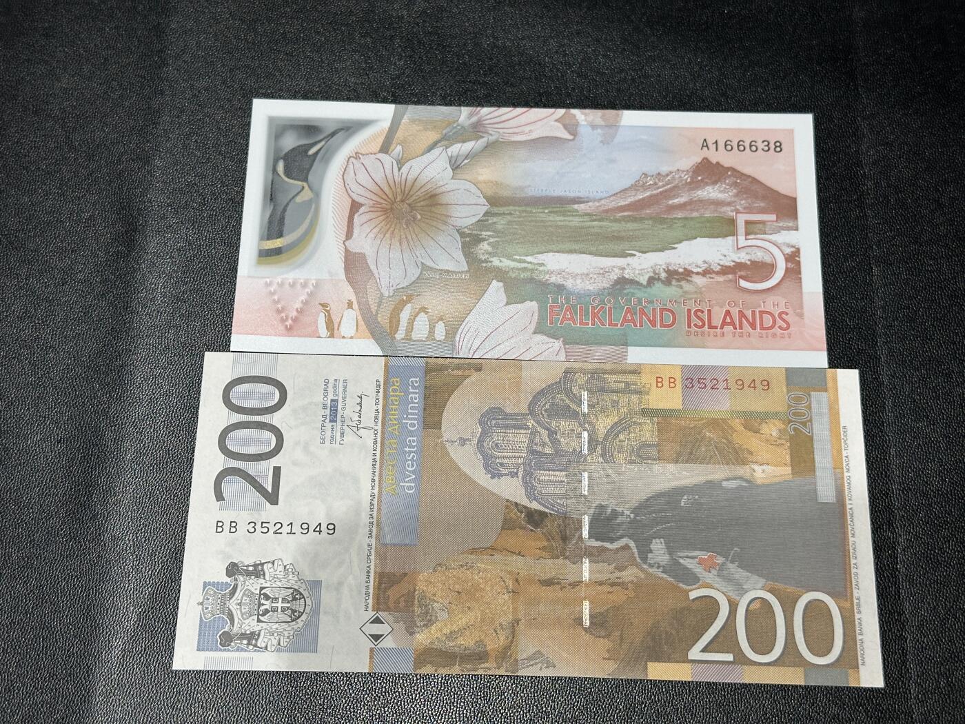 《外钞收藏家》第五百八十三期（精选场）（本期拍品丰富）（本平台长期征集拍品、欢迎藏友们联系合作） 最新版福克兰群岛5镑A冠无47尾8+塞尔维亚200第纳尔 全新UNC