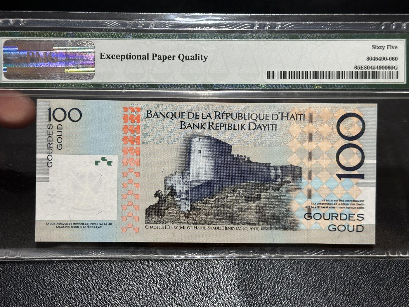《外钞收藏家》第五百八十三期（精选场）（本期拍品丰富）（本平台长期征集拍品、欢迎藏友们联系合作） 2016年海地100古德 纪念钞 PMG65 豹子号777