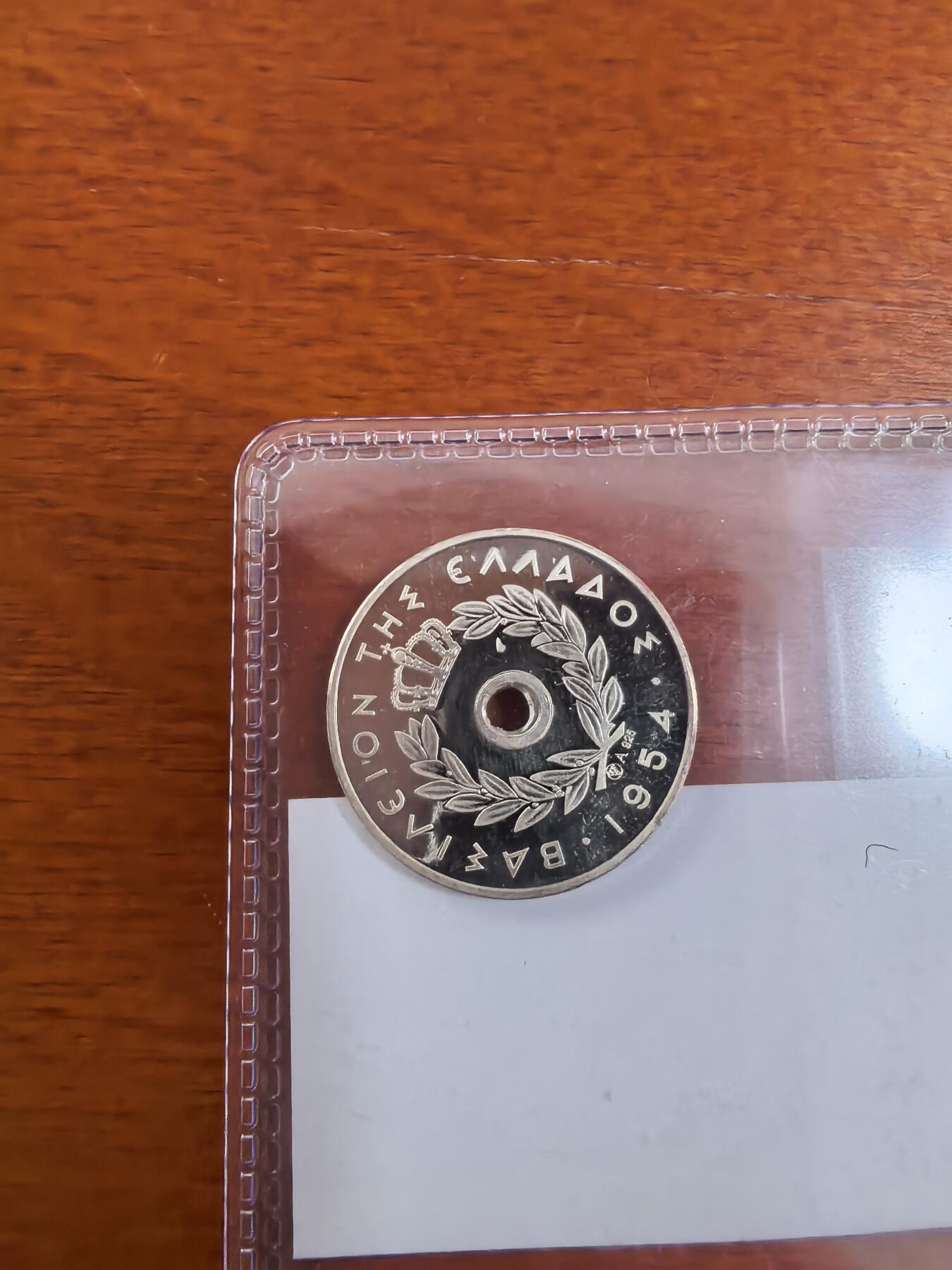 长老汇蛇年精选第七十二场拍卖 1954希腊5雷普塔中孔精制银币，N未入盒，状态极好，同一批送的另两枚入盒都是唯一记录，ebay入盒的起步10万