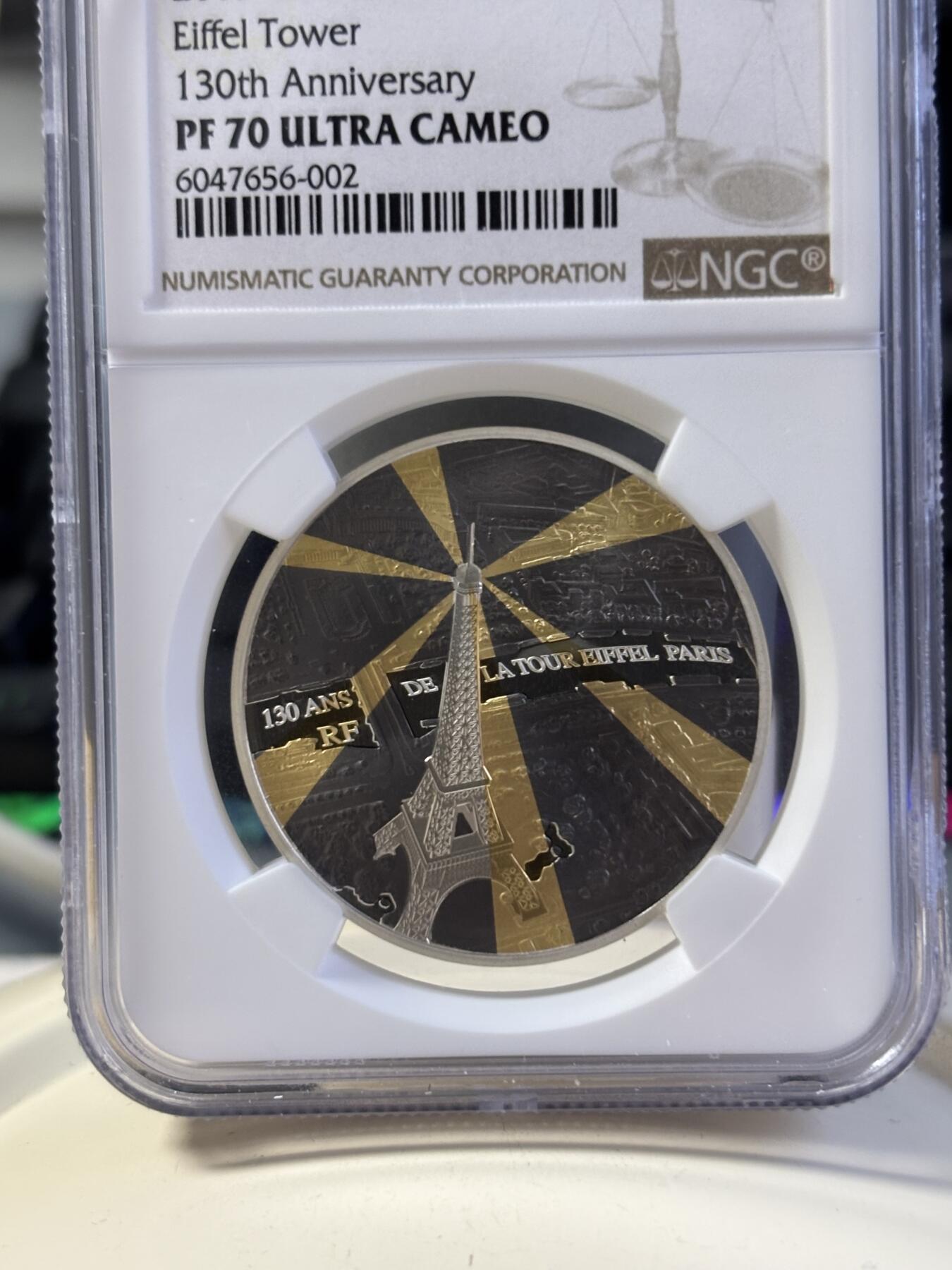 第181期拍卖 法国2019年埃菲尔铁塔130周年镀金镀铑银币NGC-PF70无盒无证书，金属:900银镀金镀铑，重量:22.2克，直径：37毫米发行：3000枚