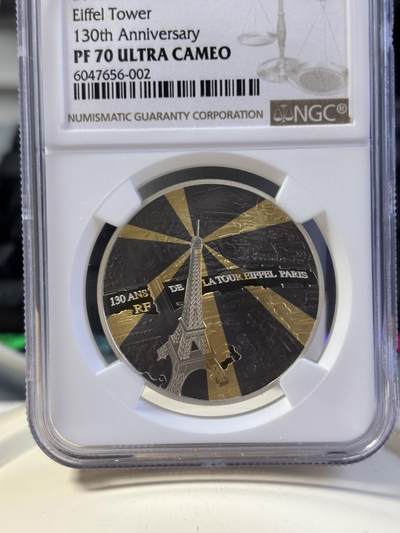 第181期拍卖 - 法国2019年埃菲尔铁塔130周年镀金镀铑银币NGC-PF70无盒无证书，金属:900银镀金镀铑，重量:22.2克，直径：37毫米发行：3000枚