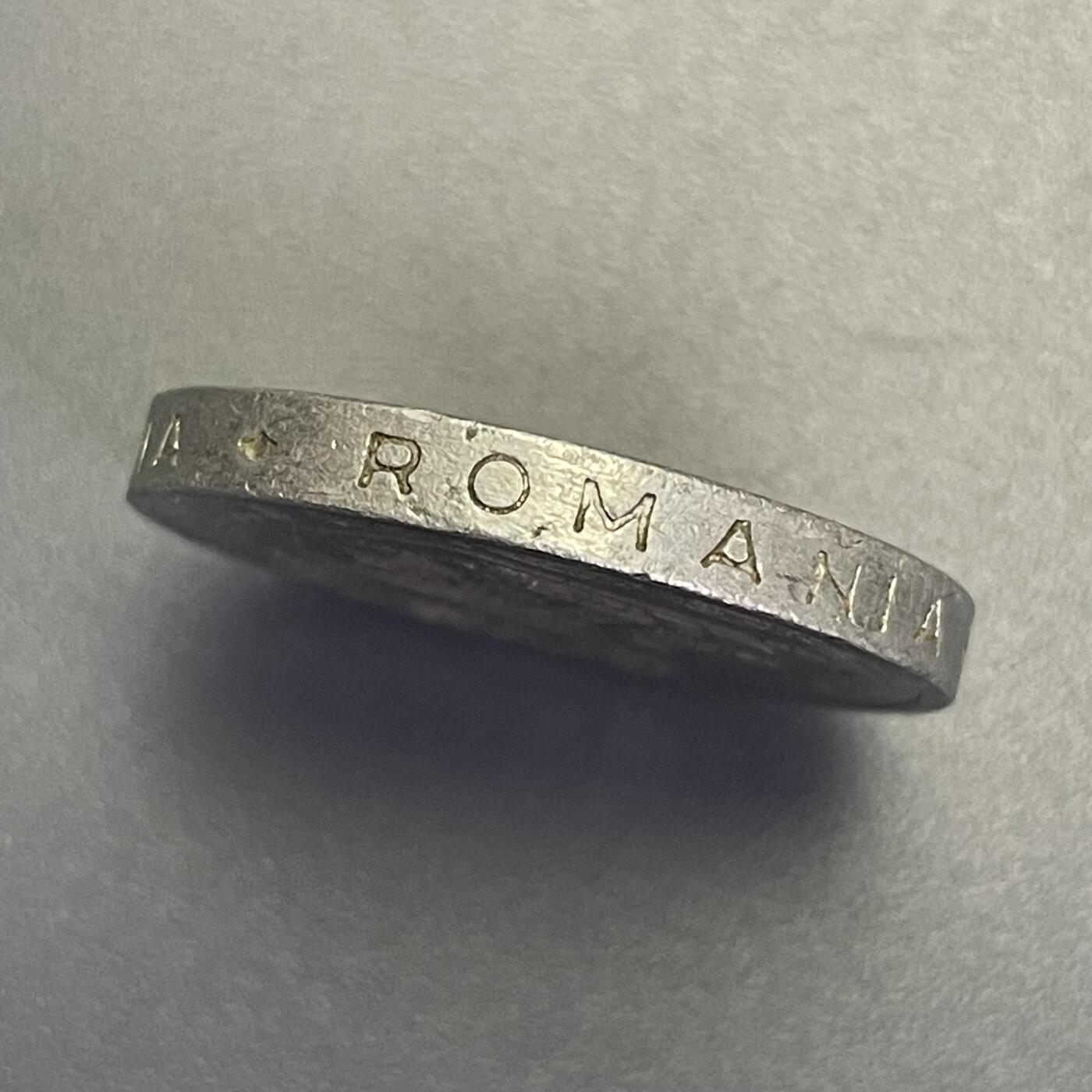 回流1115 罗马尼亚1999年500列伊铝制硬币 字边 