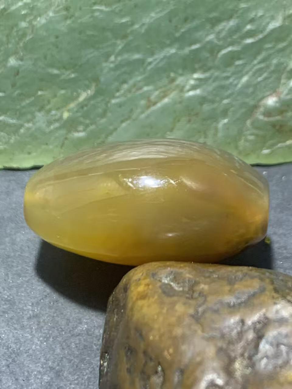 精美冻料飘鸡油黄糖心料战国红玛瑙随形勒子一颗