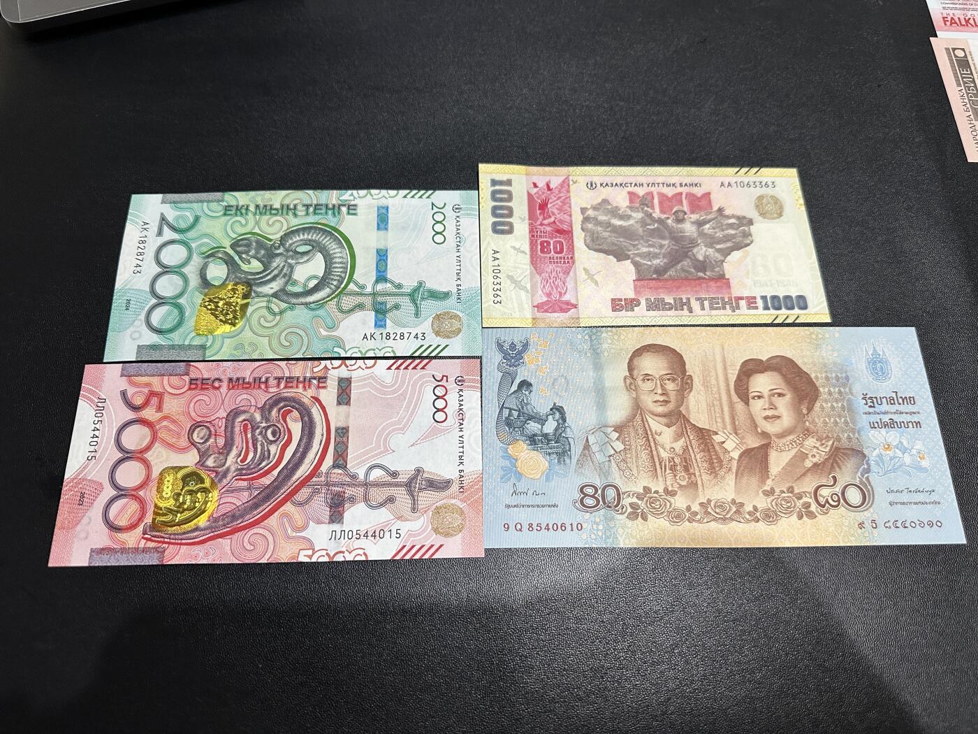 《外钞收藏家》第五百八十三期（精选场）（本期拍品丰富）（本平台长期征集拍品、欢迎藏友们联系合作） 哈萨克斯坦新版纪念钞1000全新+流通2000和5000补号+泰国80泰铢纪念钞一起 全新UNC