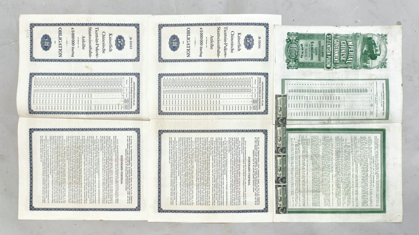 2025年吉藏纸杂文献秋季专场拍卖会 清光绪三十四年（1908年）津浦铁路公债券20镑两张；清宣统三年（1911年）津浦铁路公债券100镑一张附息票四枚 8.6×11.4cm-34.3×54.2cm