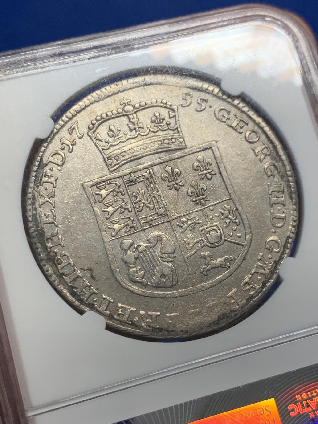 《竞宝斋》第436场 周日，周一2场连拍 （全场包邮） NGC AU55 德国1755年布伦瑞克 吕内堡 乔治三世泰勒大银币 1714年汉诺威选帝侯乔治一世依据《嗣位法》继承英国王位，而汉诺威王室源之于德国13世纪的吕内堡公爵，因此背后的徽章带有英伦的风格，这在德国泰勒当中不多见的。