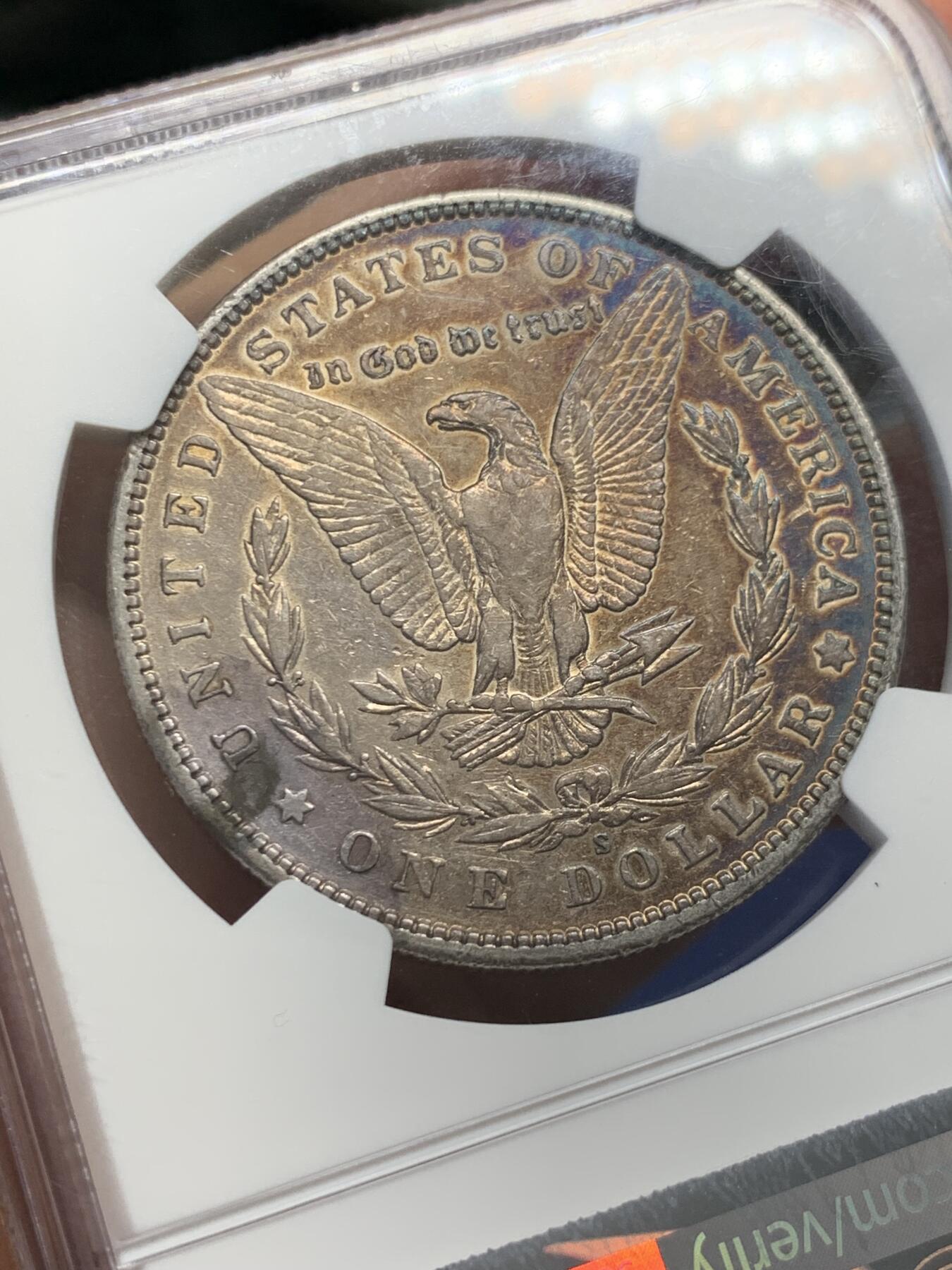 《竞宝斋》第436场 周日，周一2场连拍 （全场包邮） NGC AUD 美国1899年摩根银币S厂 少见摩根，1899年最便宜的是O厂，其次是P厂，最贵S厂， 63分白币指导价800刀，该枚橙金彩，两面深蓝月牙彩。