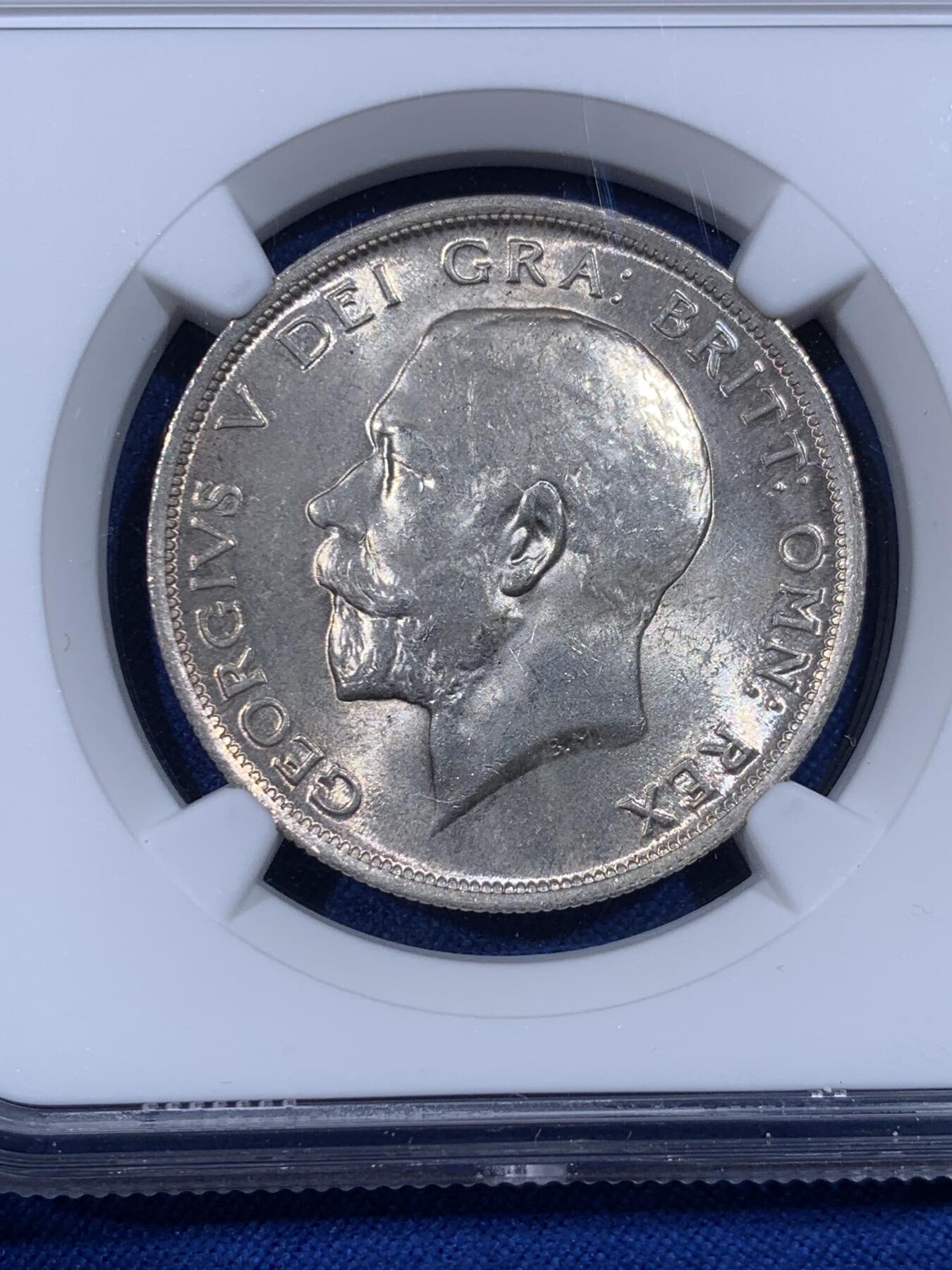 《竞宝斋》第436场 周日，周一2场连拍 （全场包邮） NGC MS65 英国1915年乔治五世半克朗银币，收藏级高分，极好品相，光度好，干净清爽。流通版能到65分难度很大，书价365美金，接近64分的两倍。P盒同分竞宝斋年初1880元不含佣成交