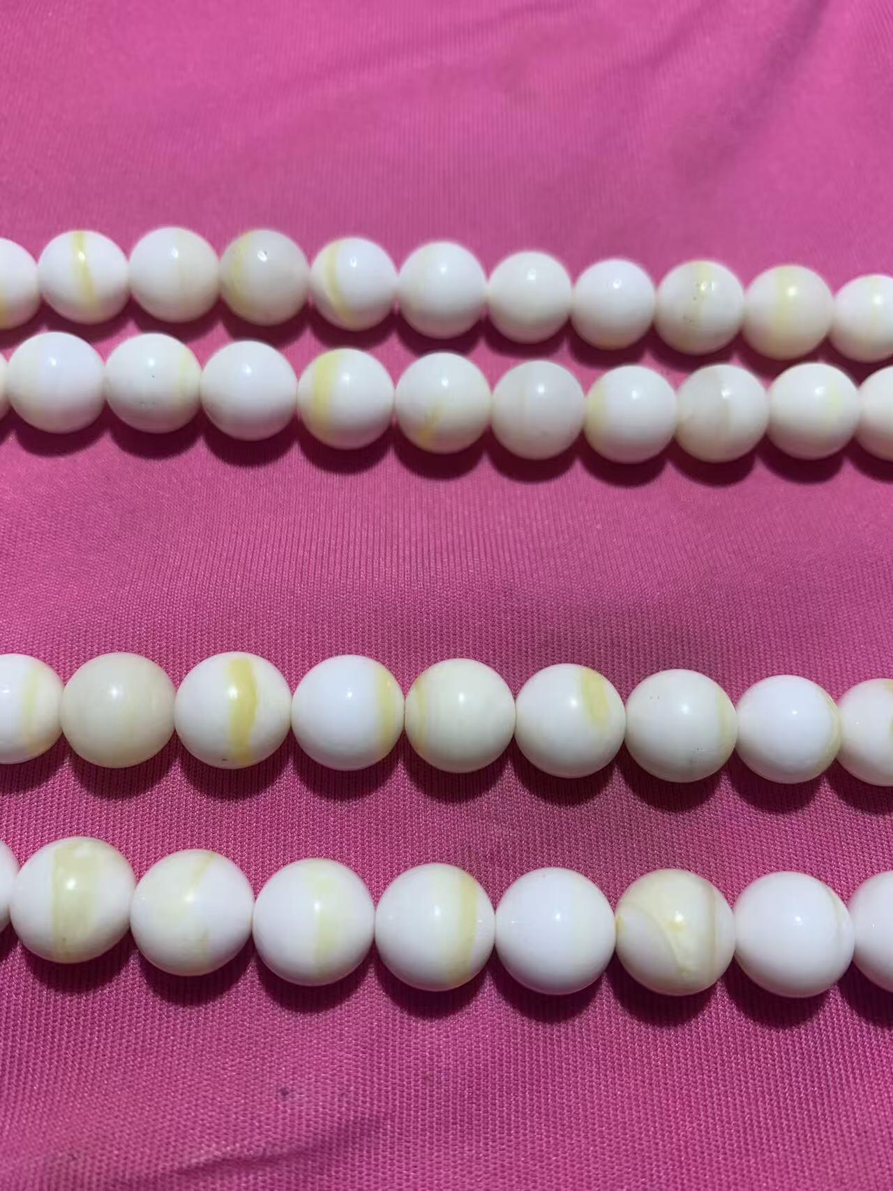 深海奶白飘黄金丝贝化玉108手串一条，