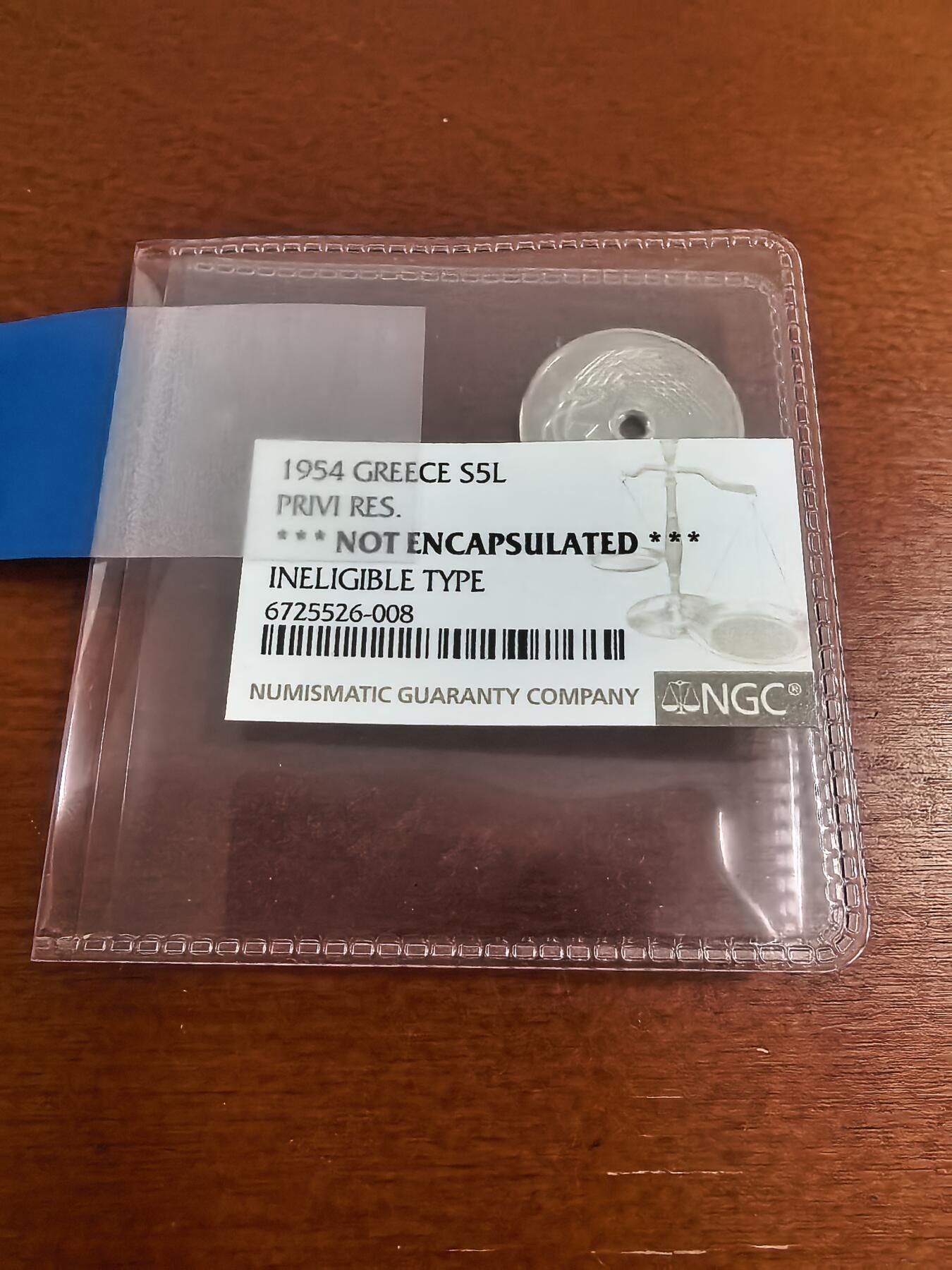 长老汇蛇年精选第七十二场拍卖 1954希腊5雷普塔中孔精制银币，N未入盒，状态极好，同一批送的另两枚入盒都是唯一记录，ebay入盒的起步10万