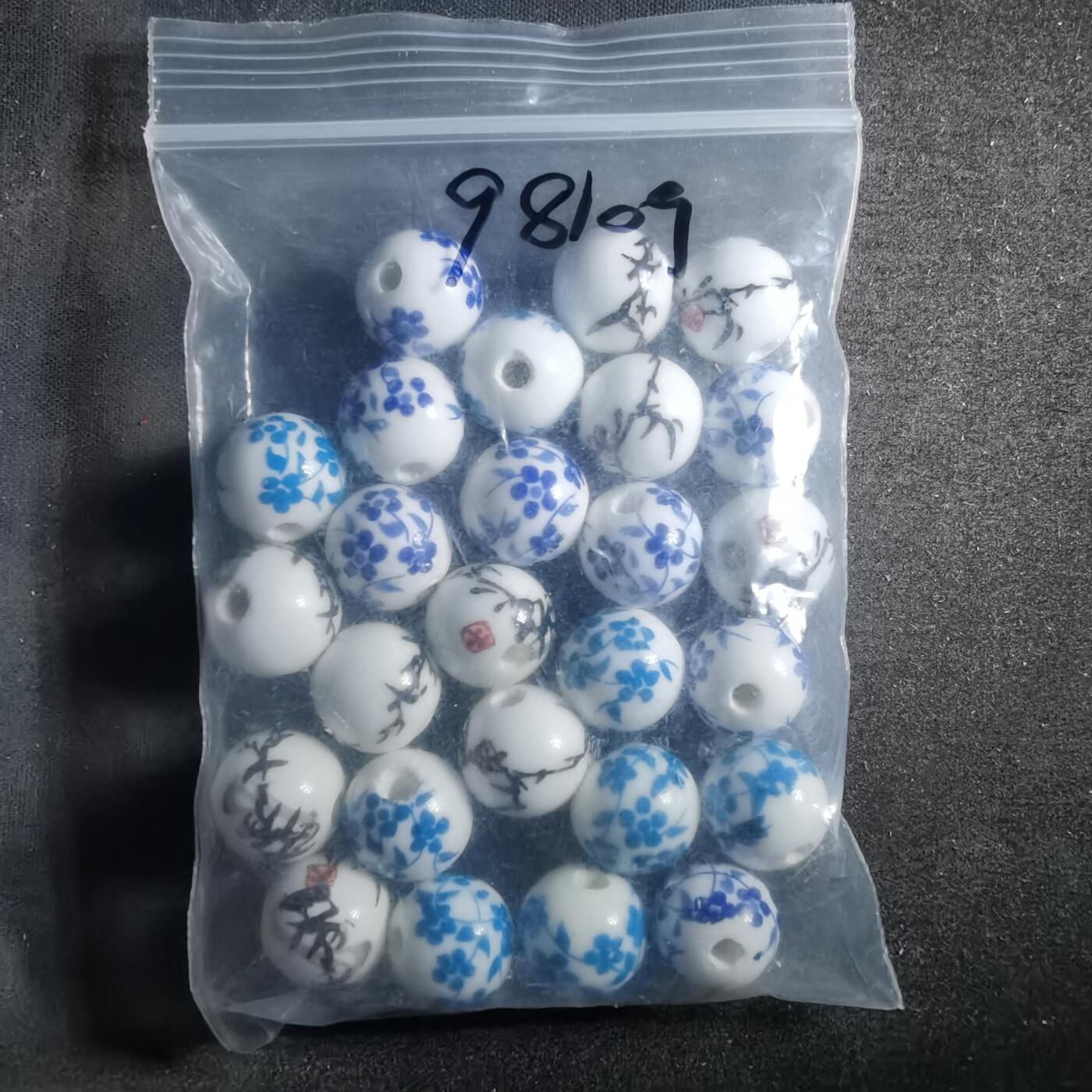 沼泽如烟--第898场 瓷珠子一袋