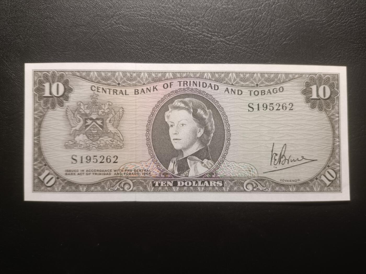 2025十一月第三期，总201期 特立尼达和多巴哥1964版10元UNC-无47，稀有女王头像序列中高面值，国徽和央行大楼以及海上钻井平台