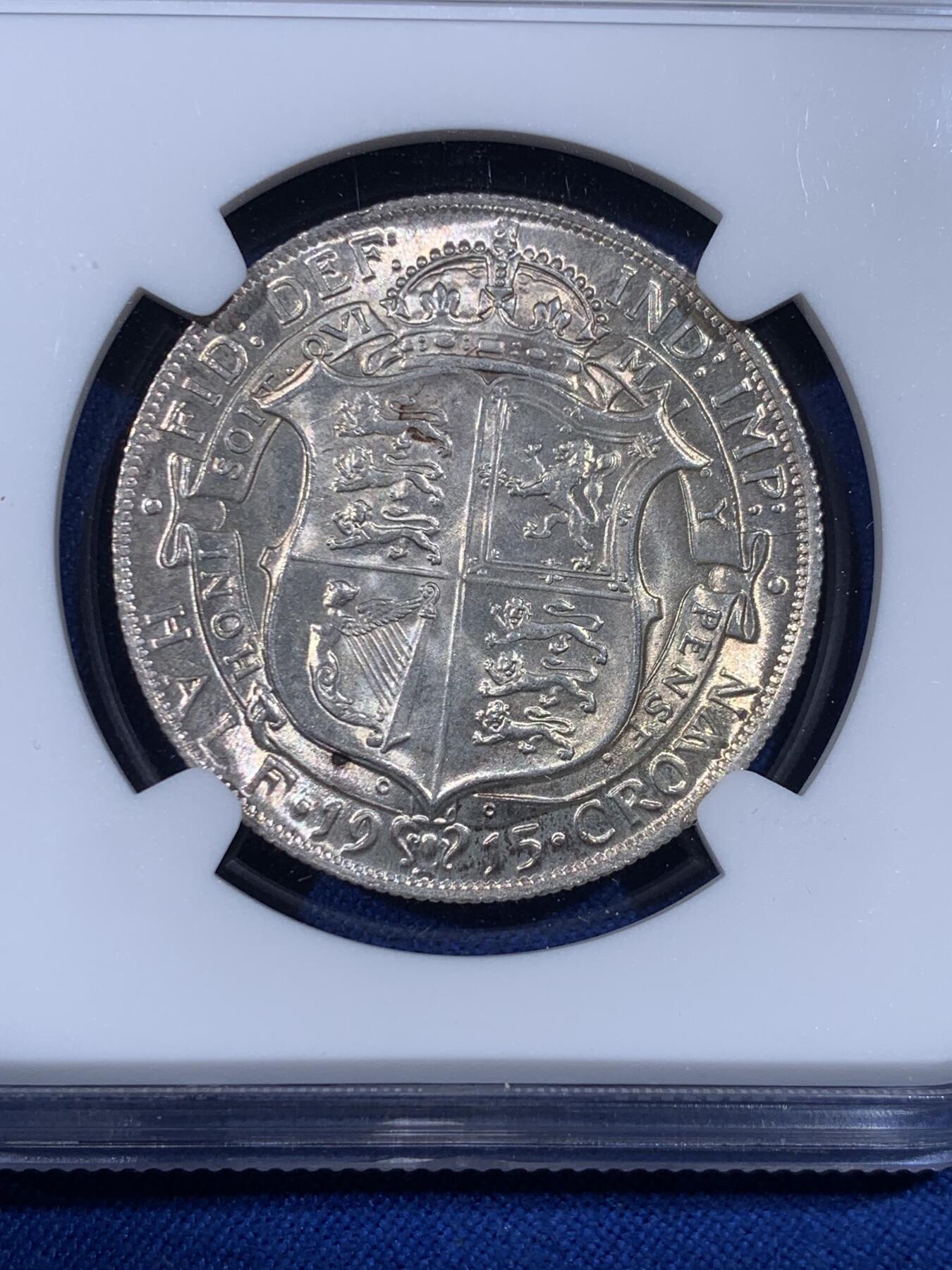 《竞宝斋》第436场 周日，周一2场连拍 （全场包邮） NGC MS65 英国1915年乔治五世半克朗银币，收藏级高分，极好品相，光度好，干净清爽。流通版能到65分难度很大，书价365美金，接近64分的两倍。P盒同分竞宝斋年初1880元不含佣成交