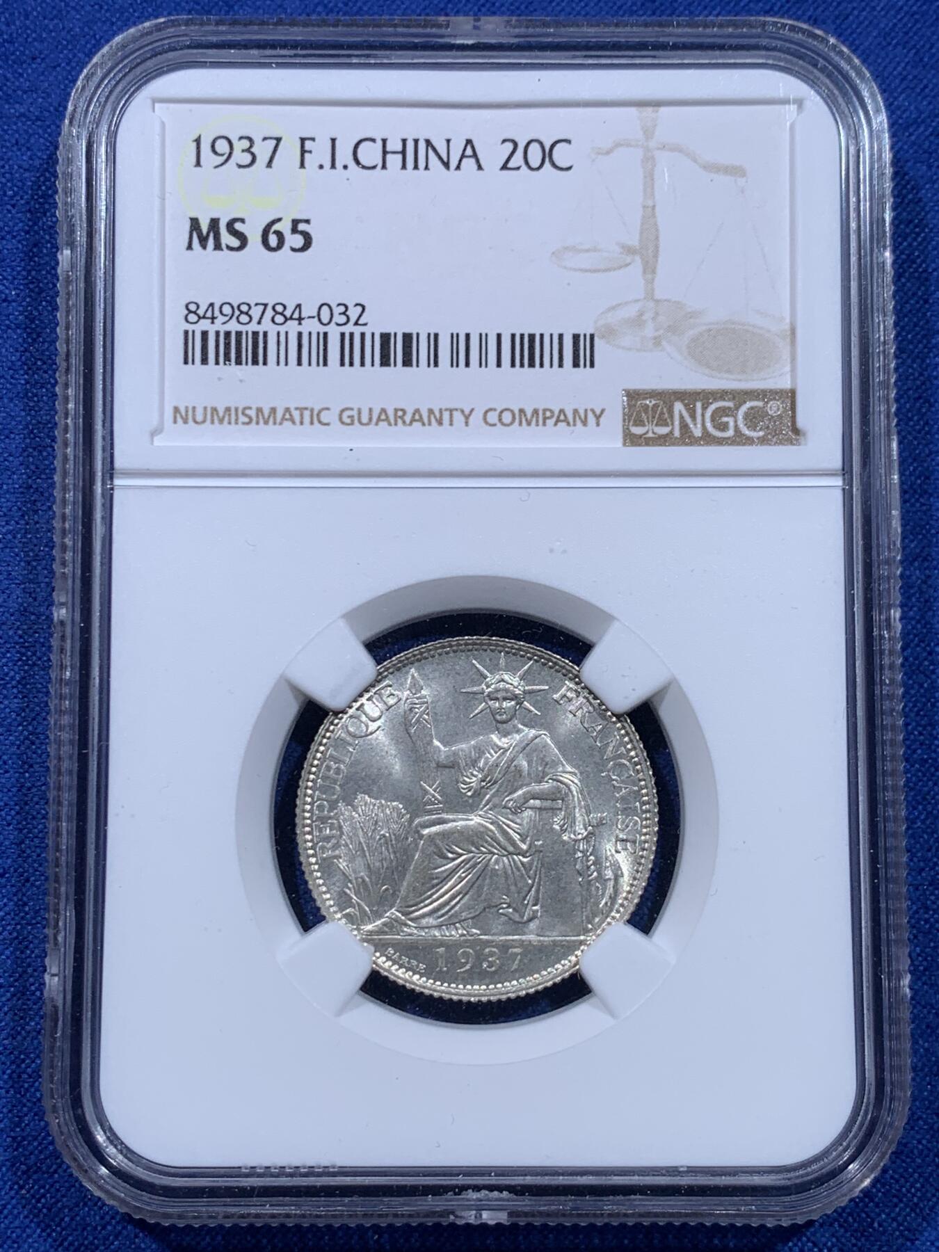 《竞宝斋》第437场 周日，周一2场连拍 （全场包邮） NGC MS65 法属印支 1937年 坐洋20分 极美品质，N压分后仍获65分，面部尽显分毫，美丽无须多言。