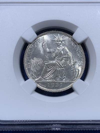 《竞宝斋》第437场 周日，周一2场连拍 （全场包邮） NGC MS65 法属印支 1937年 坐洋20分 极美品质，N压分后仍获65分，面部尽显分毫，美丽无须多言。