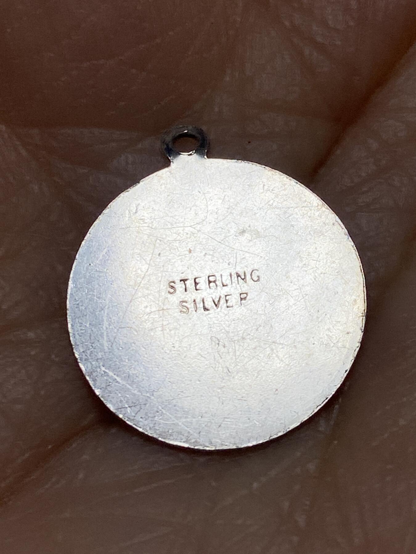 2025年第一百二十七场(总第一百五十三场）外国好品章牌、散币(免佣金) 纯银材质–圣克里斯托弗圣牌，重1.22克