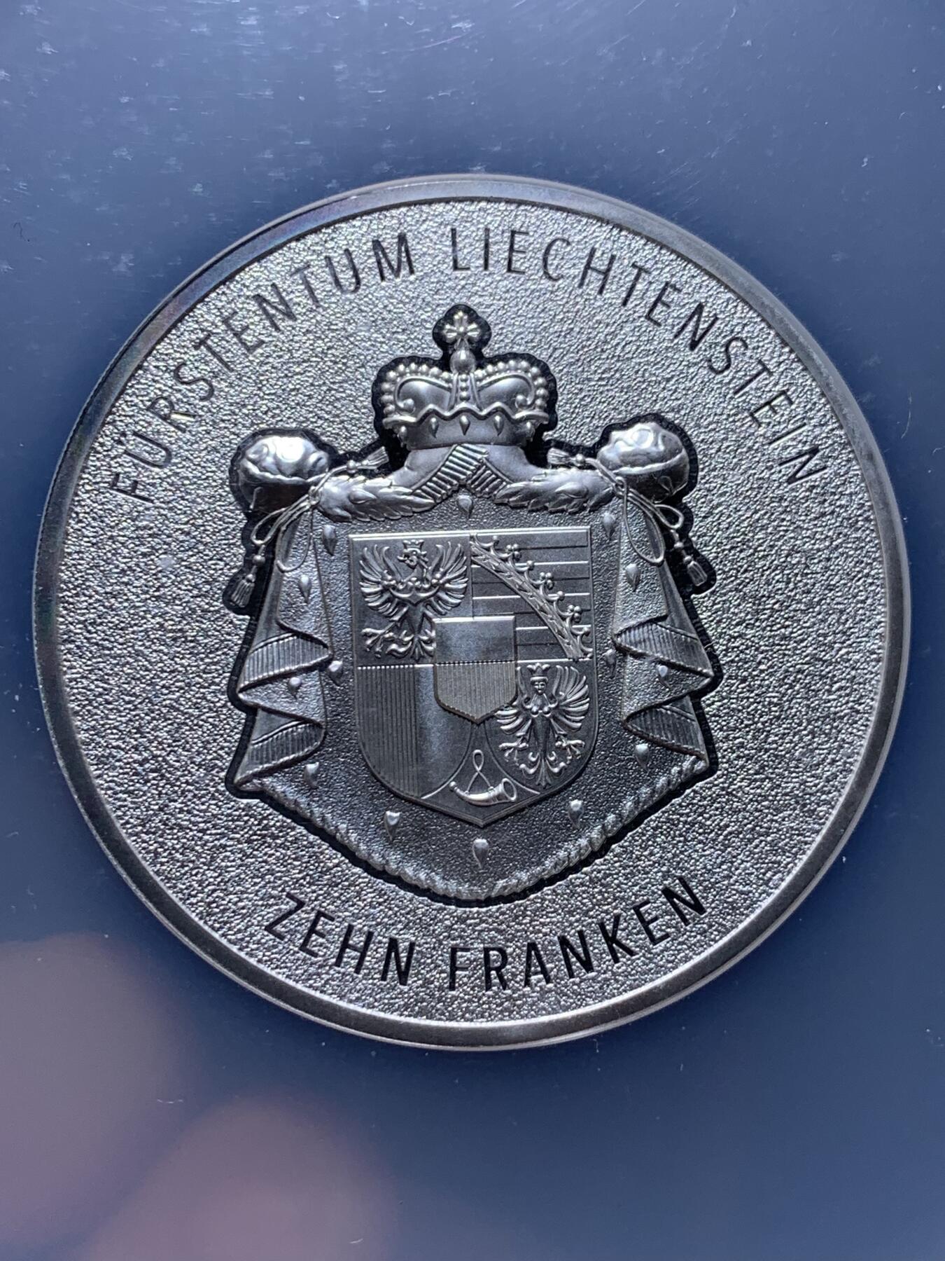 《竞宝斋》第437场 周日，周一2场连拍 （全场包邮） NGC MS70 列支敦士登2024年瑞士法郎诞生100周年 莱茵河谷 2盎司银币 首期蓝标 加大盒封装