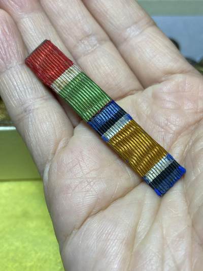 2025年第一百二十七场(总第一百五十三场）外国好品章牌、散币(免佣金) - 方格略章一枚，重5.63克