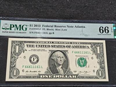 刘世昌艺术品销售中心～虎踞龙蟠*金杨在线联拍群第509期 - 美国2013年1美元【倒置号】【数2】【双豹子头】（PMG    66E    号码：F66611161L）1枚。