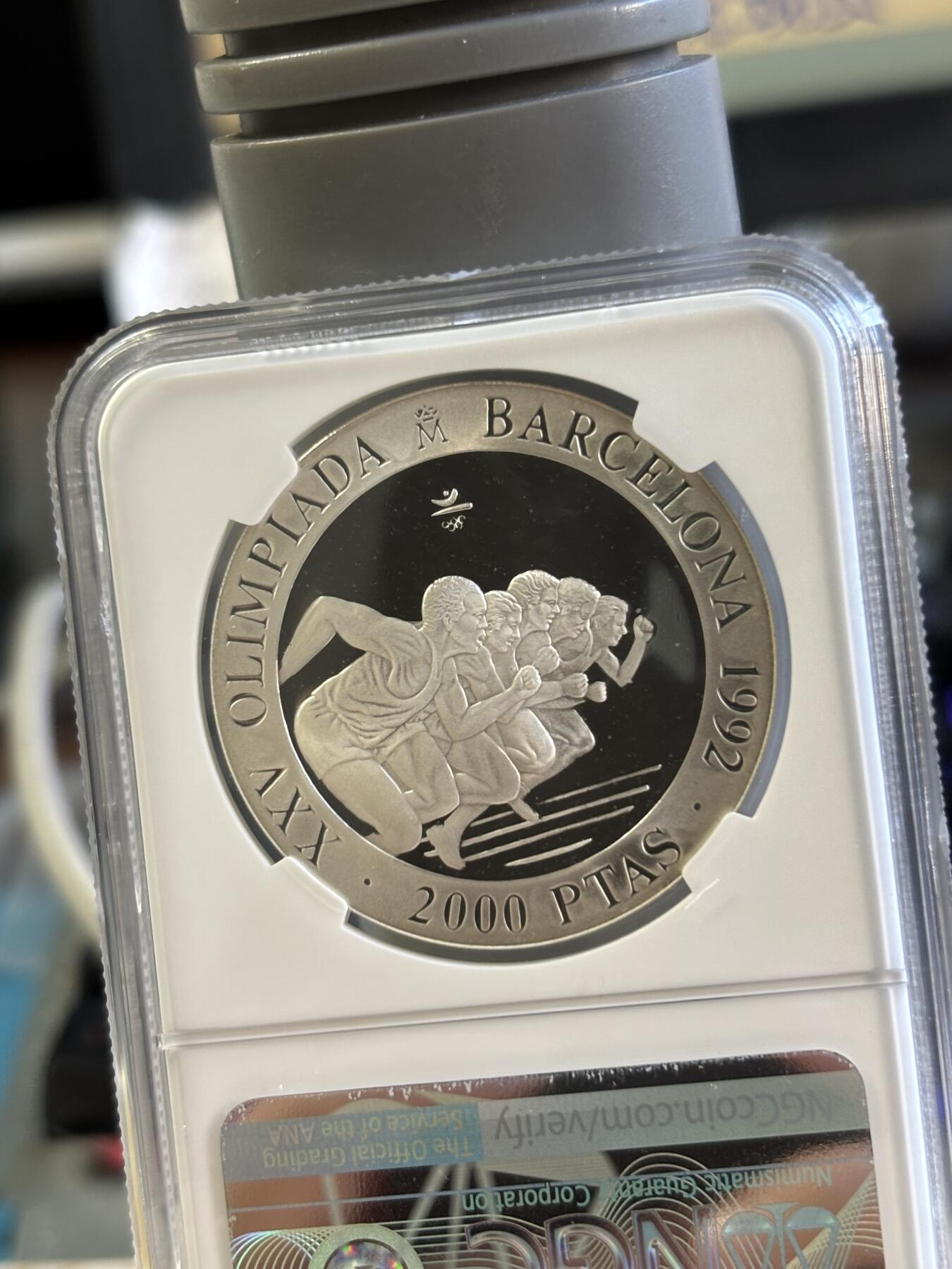 第181期拍卖 获奖币西班牙1992年巴塞罗那奥运会-赛跑纪念银币NGC-PF69，获年度最佳银币-，925银，27克