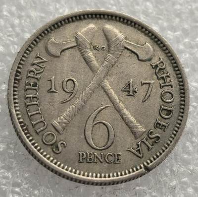 外国优质老铜币银币，周六九点倒数截拍，满百包邮，可寄存半年，喜欢朋友微信扫描二维码可直接参拍 - 南罗德西亚1947年双斧头6便士