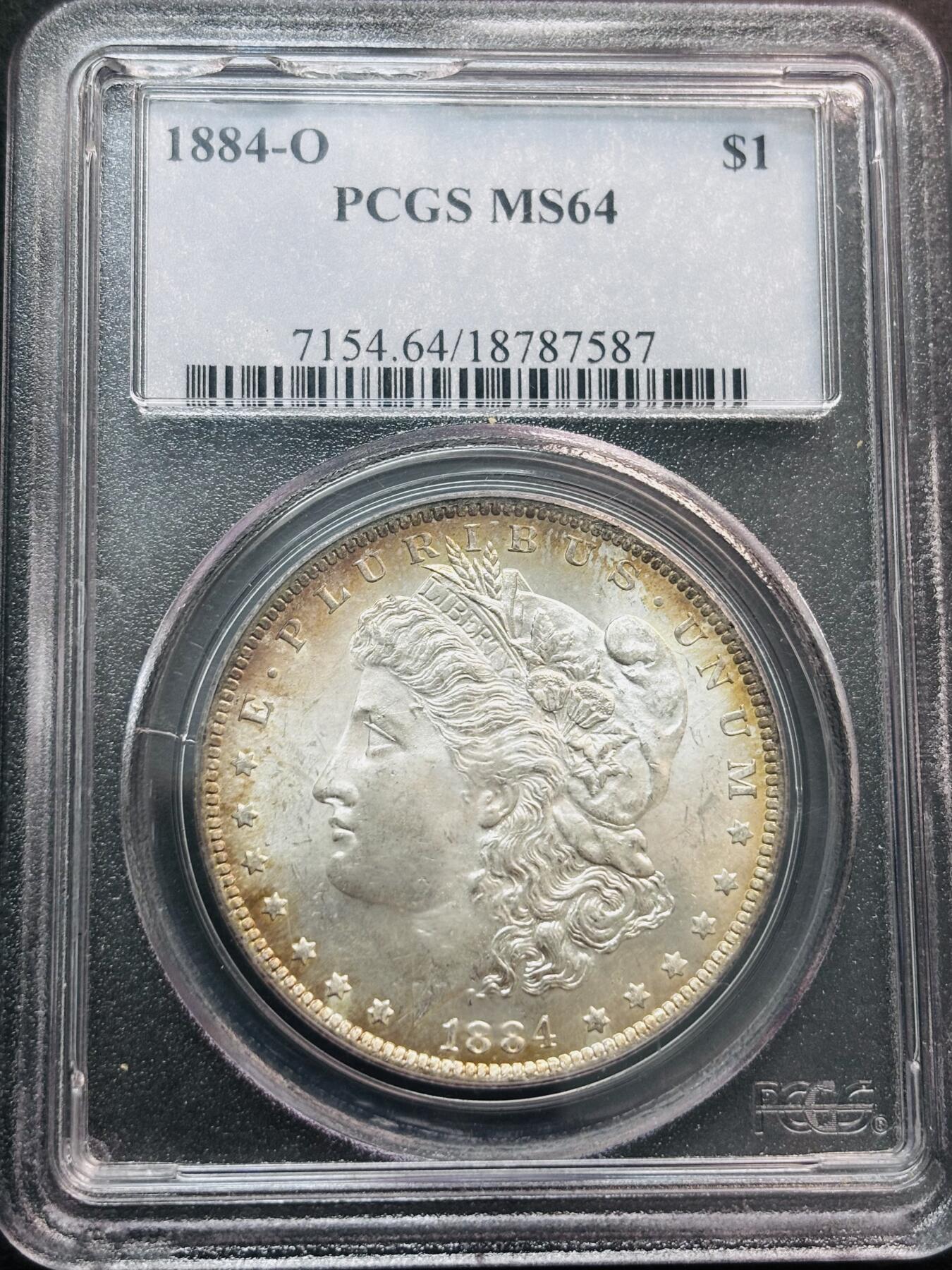 文馨钱币收藏第 281 场，【 长期接收代拍品】银元，银币，套币，纸币专场（本场截拍后休息三天，19 号发货） 1884 年美国摩根一元银元 O 版 PCGS 评级 MS64 分，彩金炫光，靓丽夺目