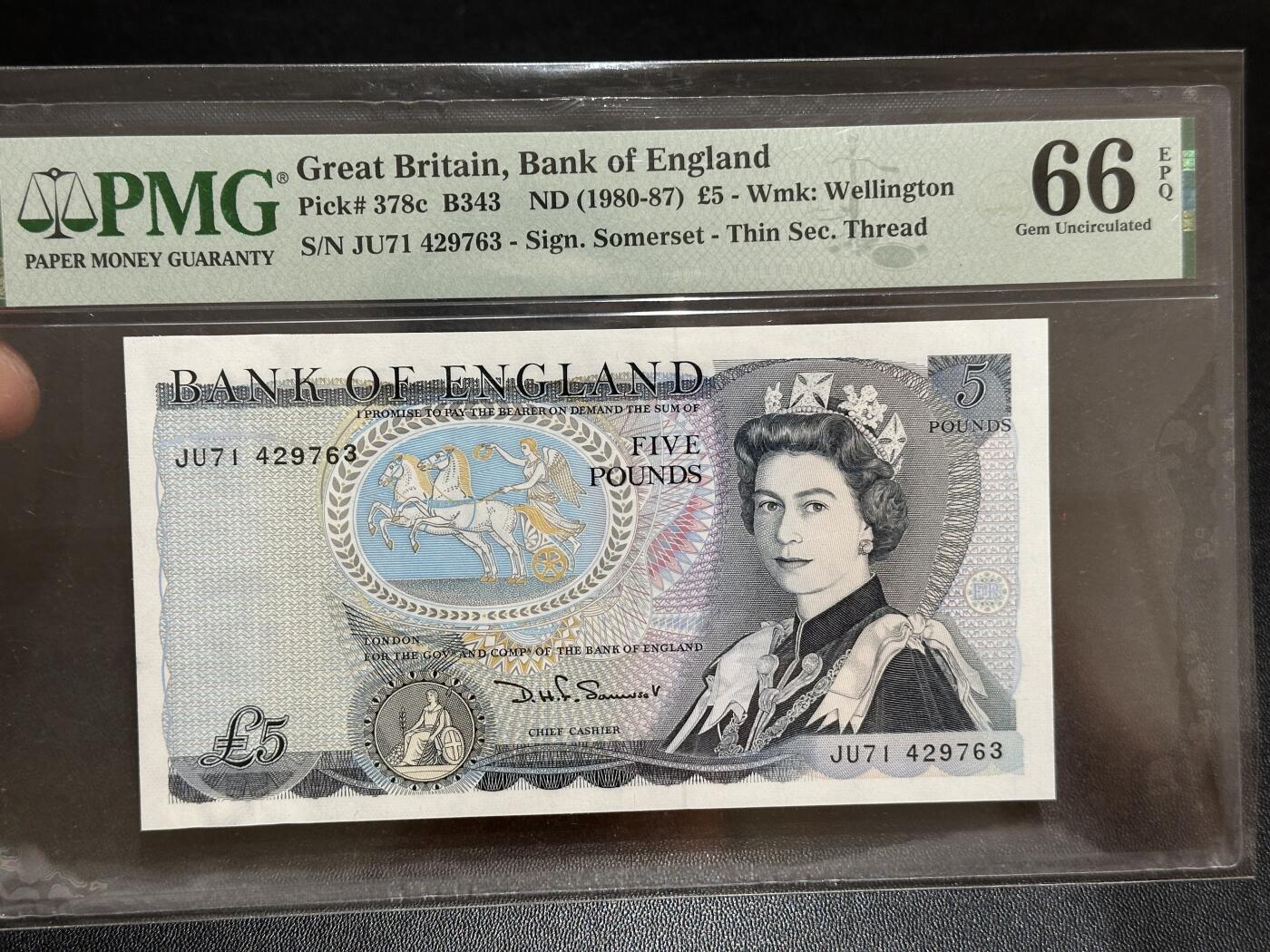 《外钞收藏家》第五百八十四期（优质场）（本平台长期征集拍品、欢迎藏友们联系合作） 1980-87年英国D序列5镑 PMG66