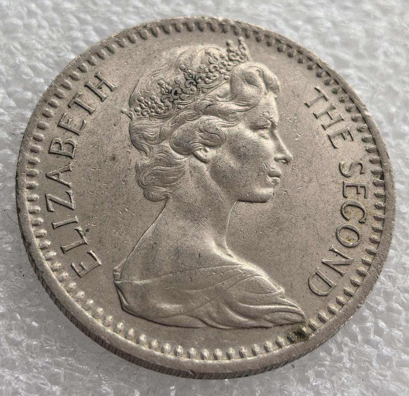 外国优质老铜币银币，周六九点倒数截拍，满百包邮，可寄存半年，喜欢朋友微信扫描二维码可直接参拍 罗德西亚1964年半克朗