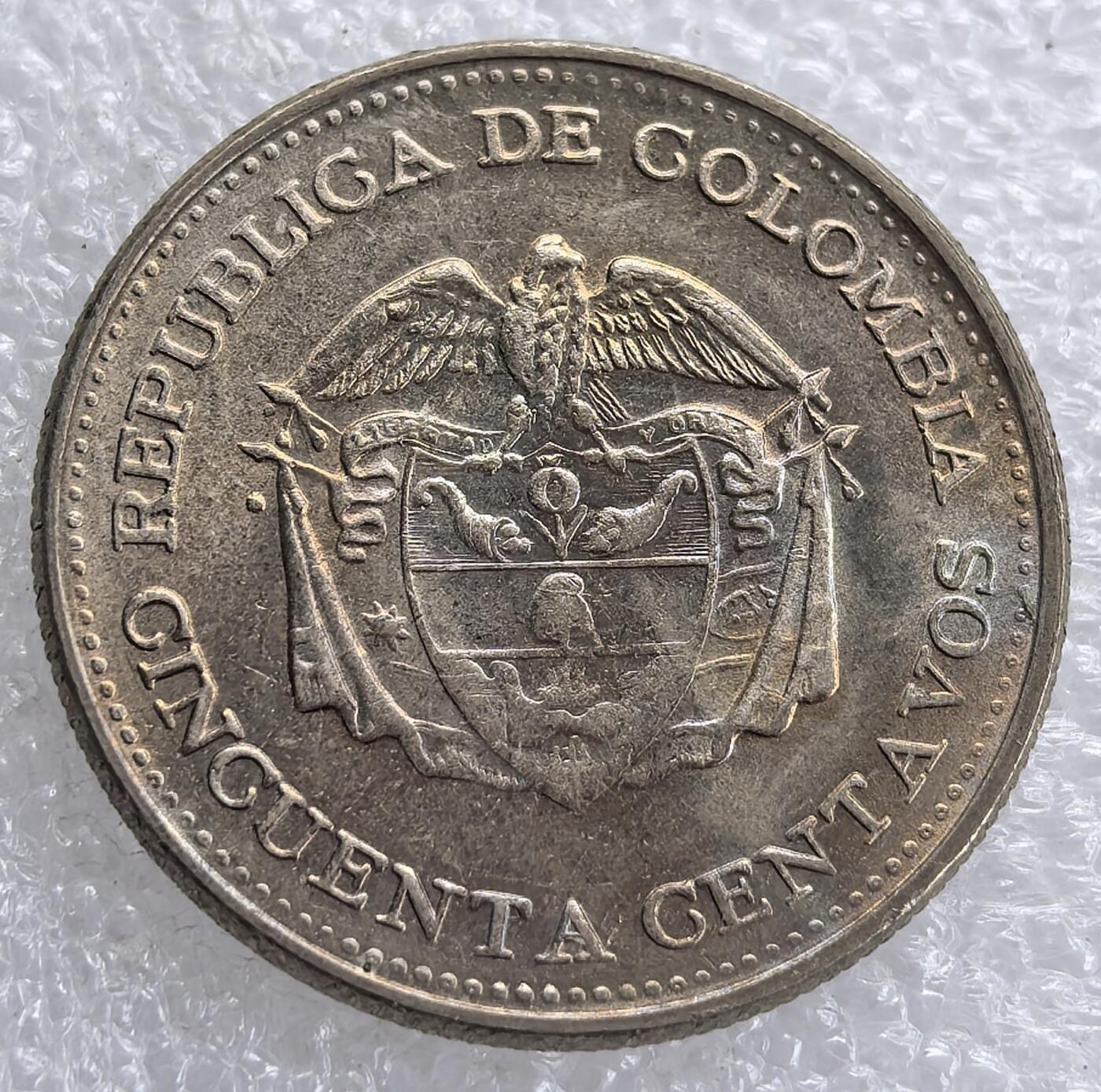 外国优质老铜币银币，周六九点倒数截拍，满百包邮，可寄存半年，喜欢朋友微信扫描二维码可直接参拍 哥伦比亚1964年50分大币