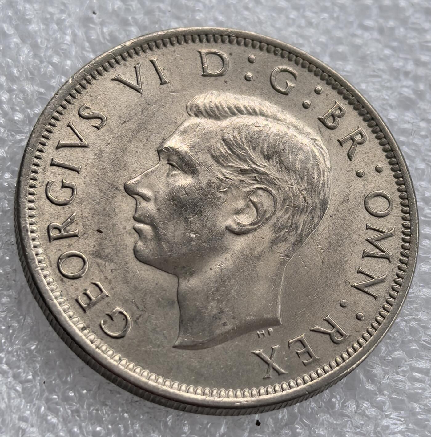 外国优质老铜币银币，周六九点倒数截拍，满百包邮，可寄存半年，喜欢朋友微信扫描二维码可直接参拍 好品英国1948年半克朗