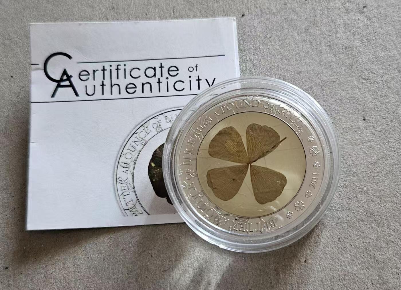 ❤️【币观天下】❤️ 第330期钱币拍卖- 2025.11.14周五晚上6点半场-长期征集拍品 帕劳2011年幸运四叶草1银币带证书币完好四叶草覆盖物老化底部有裂品如图