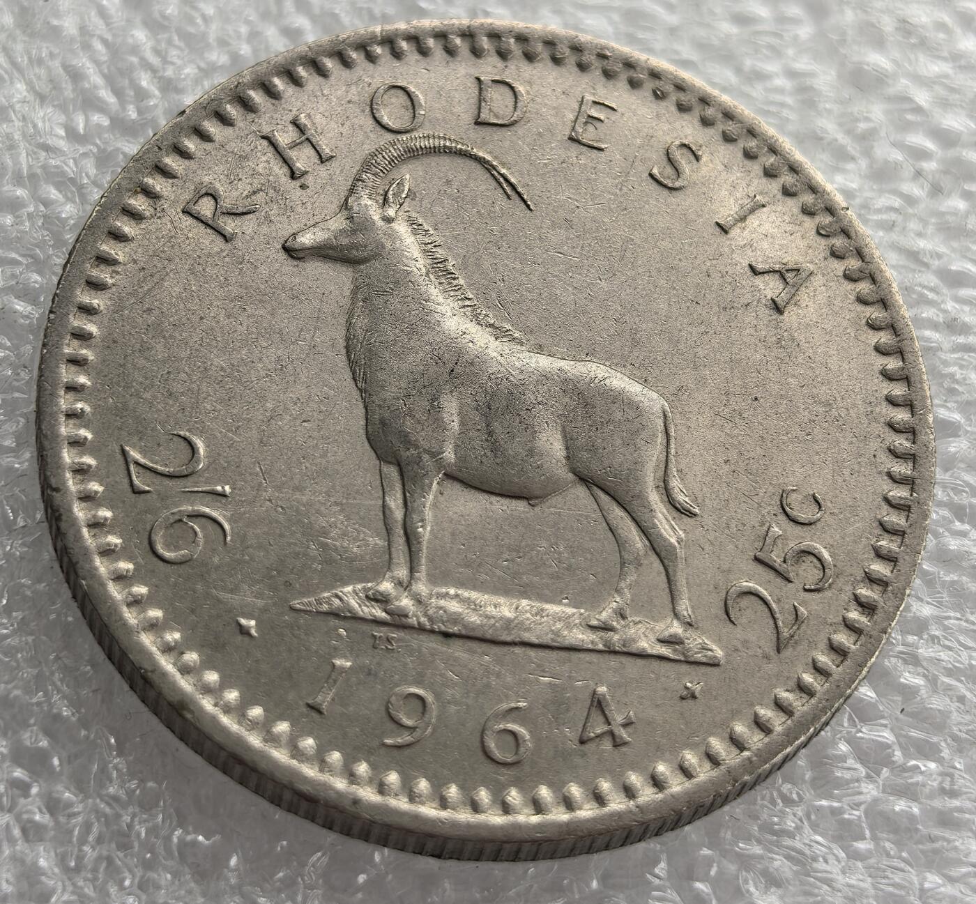 外国优质老铜币银币，周六九点倒数截拍，满百包邮，可寄存半年，喜欢朋友微信扫描二维码可直接参拍 罗德西亚1964年半克朗