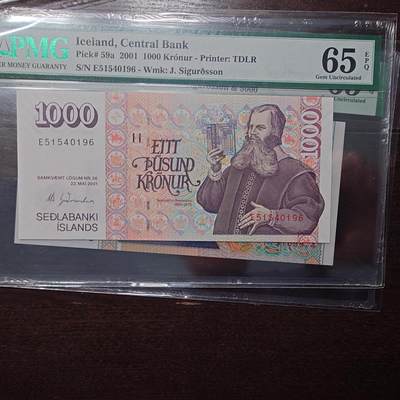 世界钱币～微拍第214期暨2025年第54期  双11评级币特惠拍 - 2001年冰岛1000克朗 PMG65E