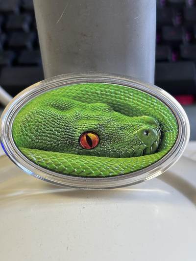 第181期拍卖 - 纽埃2016年动物皮肤绿树蟒彩色蟒蛇纪念银币,999银，发行700枚