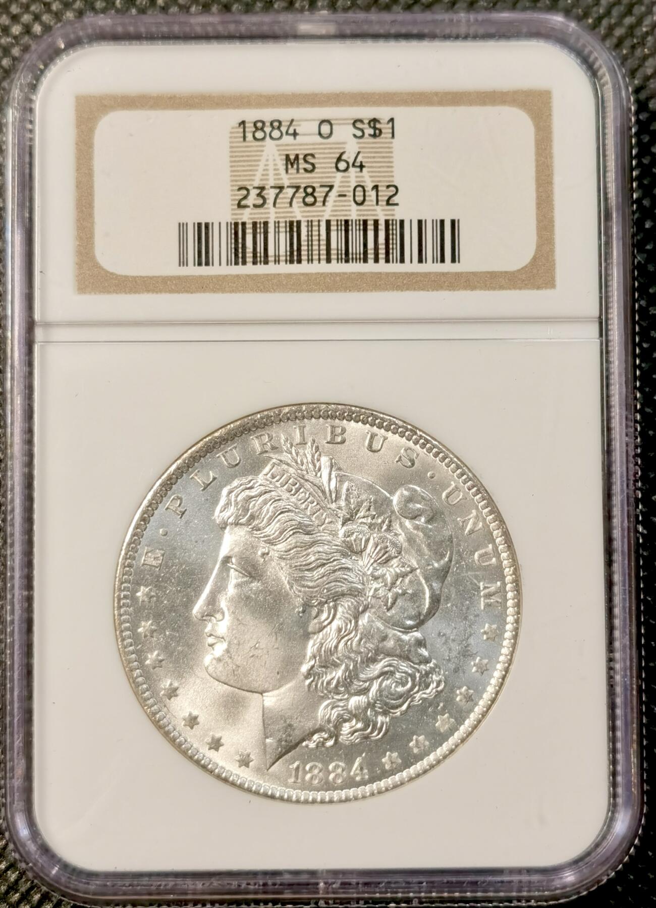 甄臻铺-世界币章拍卖（第39期）送拍享返佣金等优惠多多 NGC-MS64 1884年O版美国摩根，小白盒，手感不错，币面干净