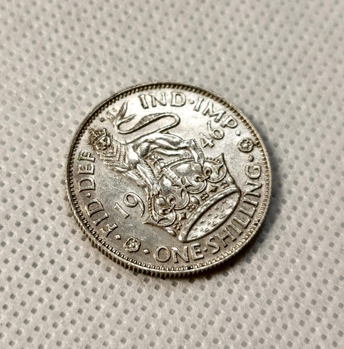 甄臻铺-世界币章拍卖（第39期）送拍享返佣金等优惠多多 英国乔治六世1先令 1942  23.5mm  1.8mm 5.7g  0.5Ag