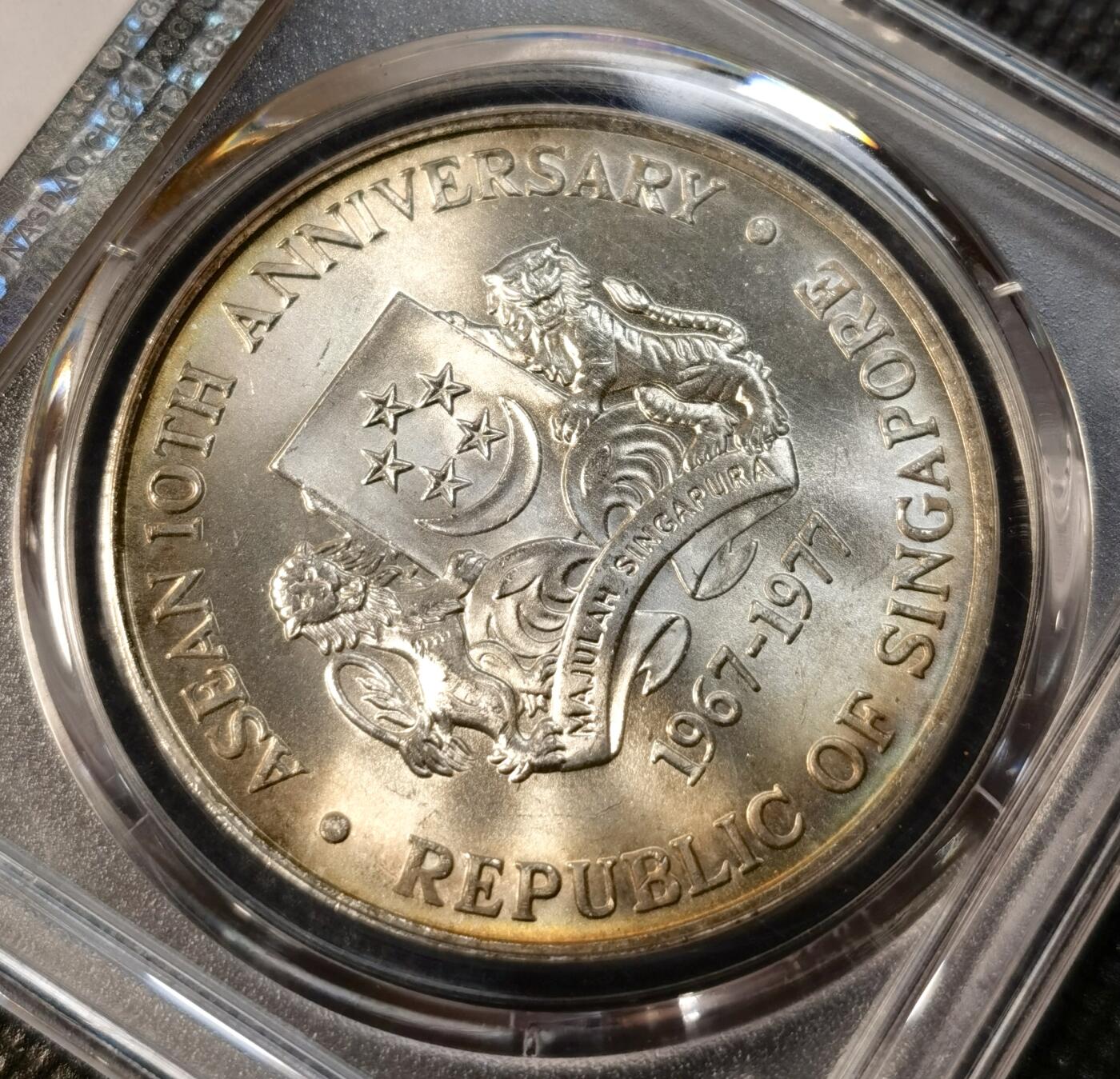 甄臻铺-世界币章拍卖（第39期）送拍享返佣金等优惠多多 PCGS-MS66 新加坡1977年10元精制银币 31克 东盟成立10周年纪念币