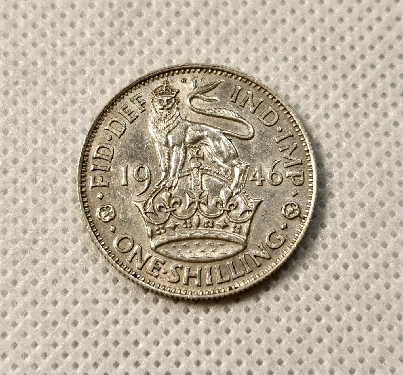 甄臻铺-世界币章拍卖（第39期）送拍享返佣金等优惠多多 英国乔治六世1先令 1942  23.5mm  1.8mm 5.7g  0.5Ag