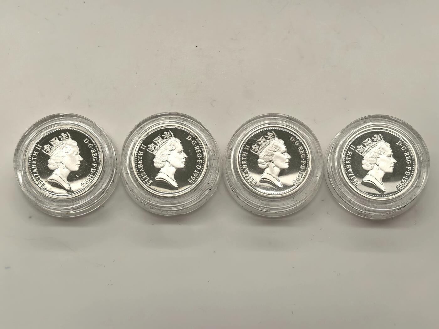 博洋堂世界钱币拍卖第146期（全场包邮） 英国1994-97年1镑精制银币4枚套装原盒证书