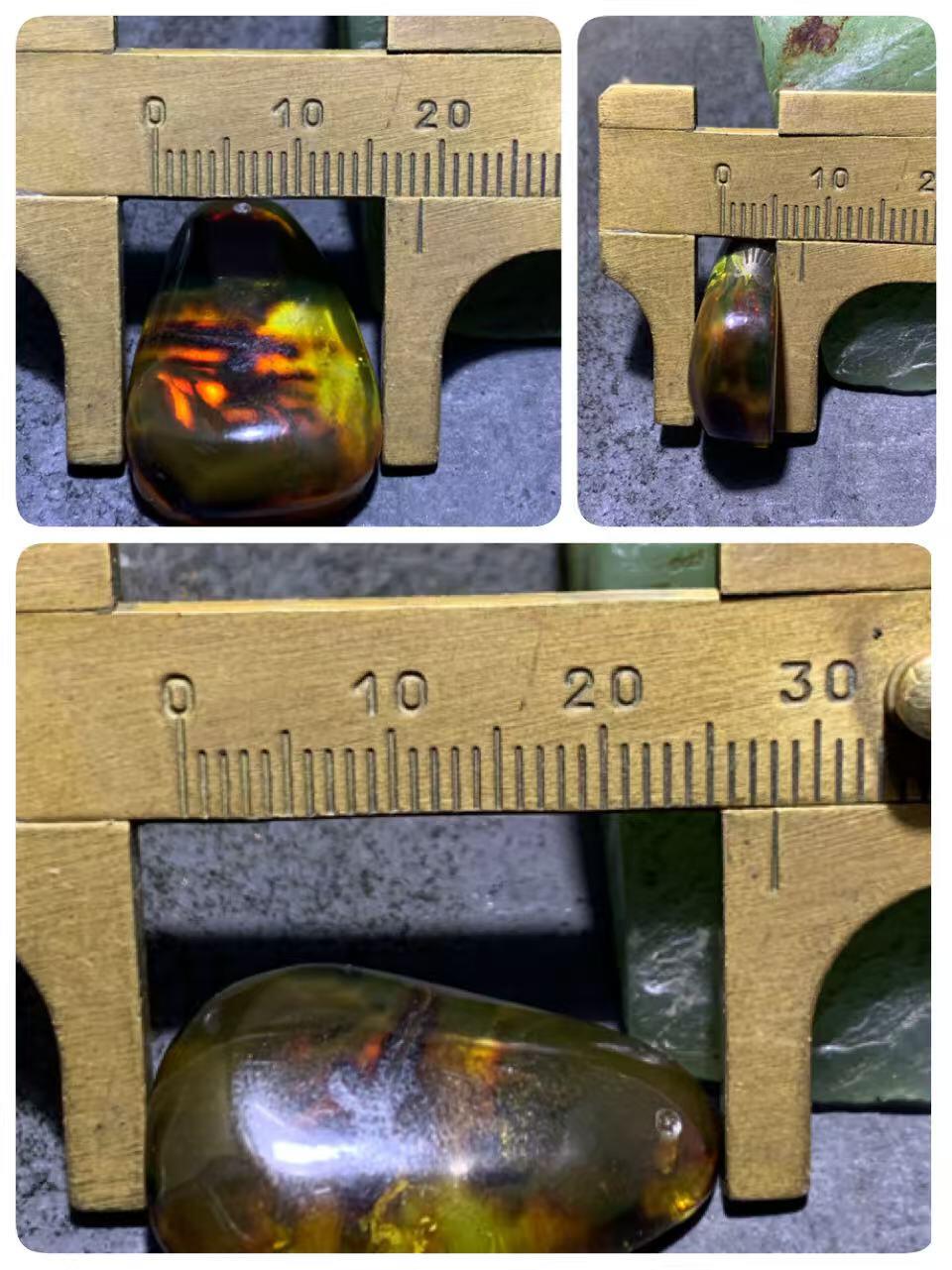 乌克兰蜜蜡随形通货吊坠一个，