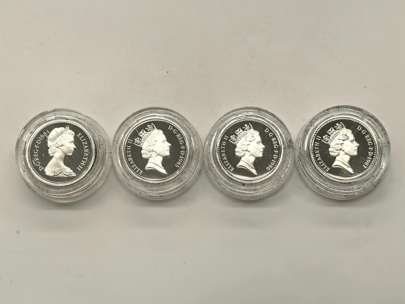 博洋堂世界钱币拍卖第146期（全场包邮） 英国1984-87年1镑精制银币4枚套装原盒证书