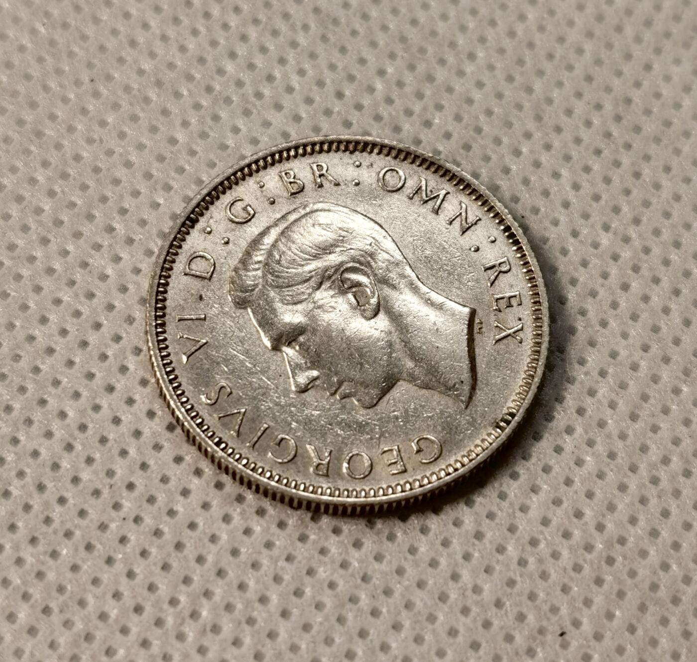 甄臻铺-世界币章拍卖（第39期）送拍享返佣金等优惠多多 英国乔治六世1先令 1942  23.5mm  1.8mm 5.7g  0.5Ag