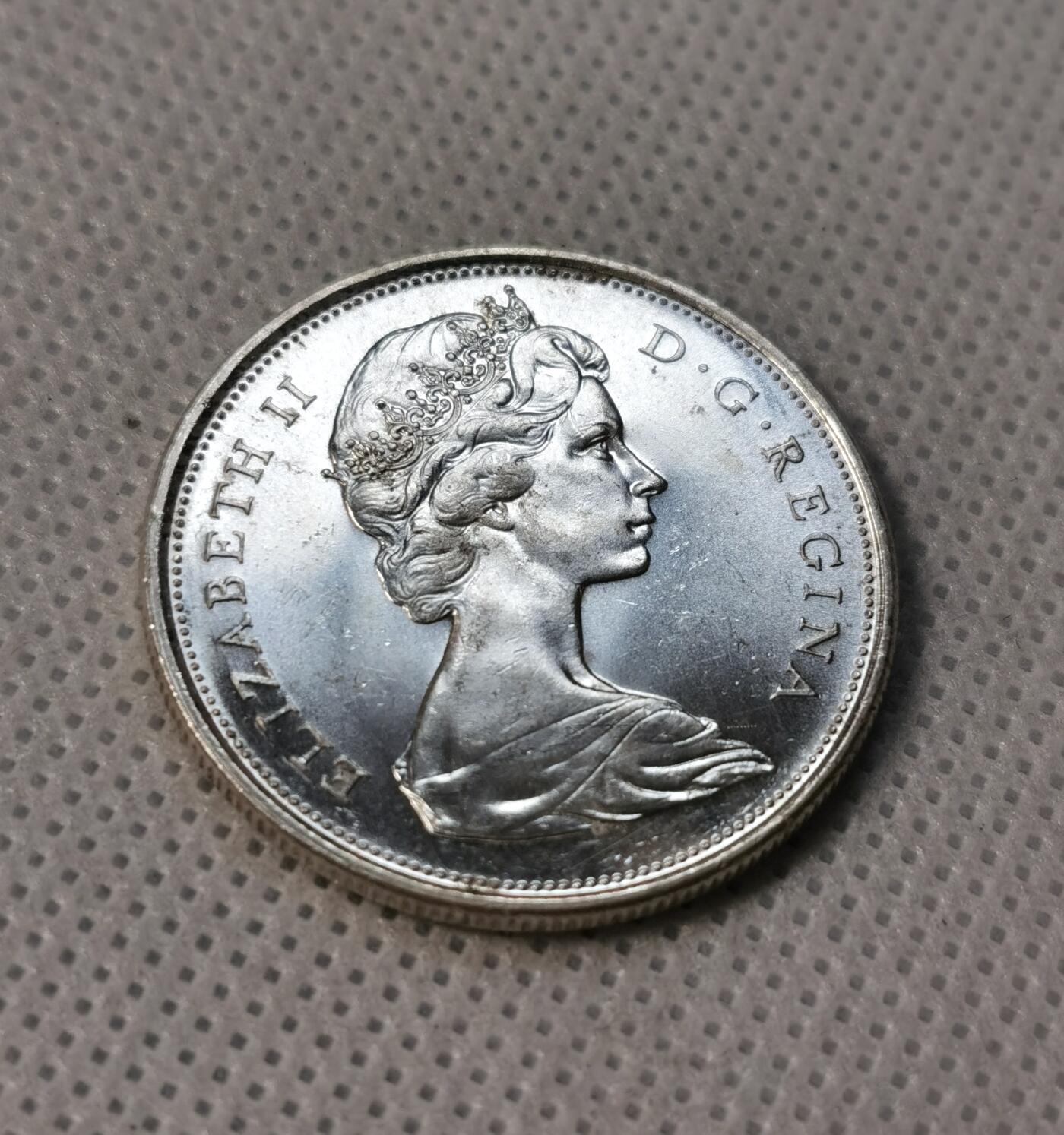 甄臻铺-世界币章拍卖（第39期）送拍享返佣金等优惠多多 加拿大独立百年狼嚎50分银币  1967 30mm 2.0mm 11.6g 80Ag